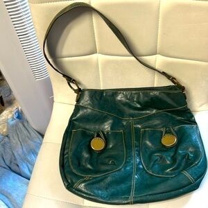 Green access purse very minor wear on backside great for fall